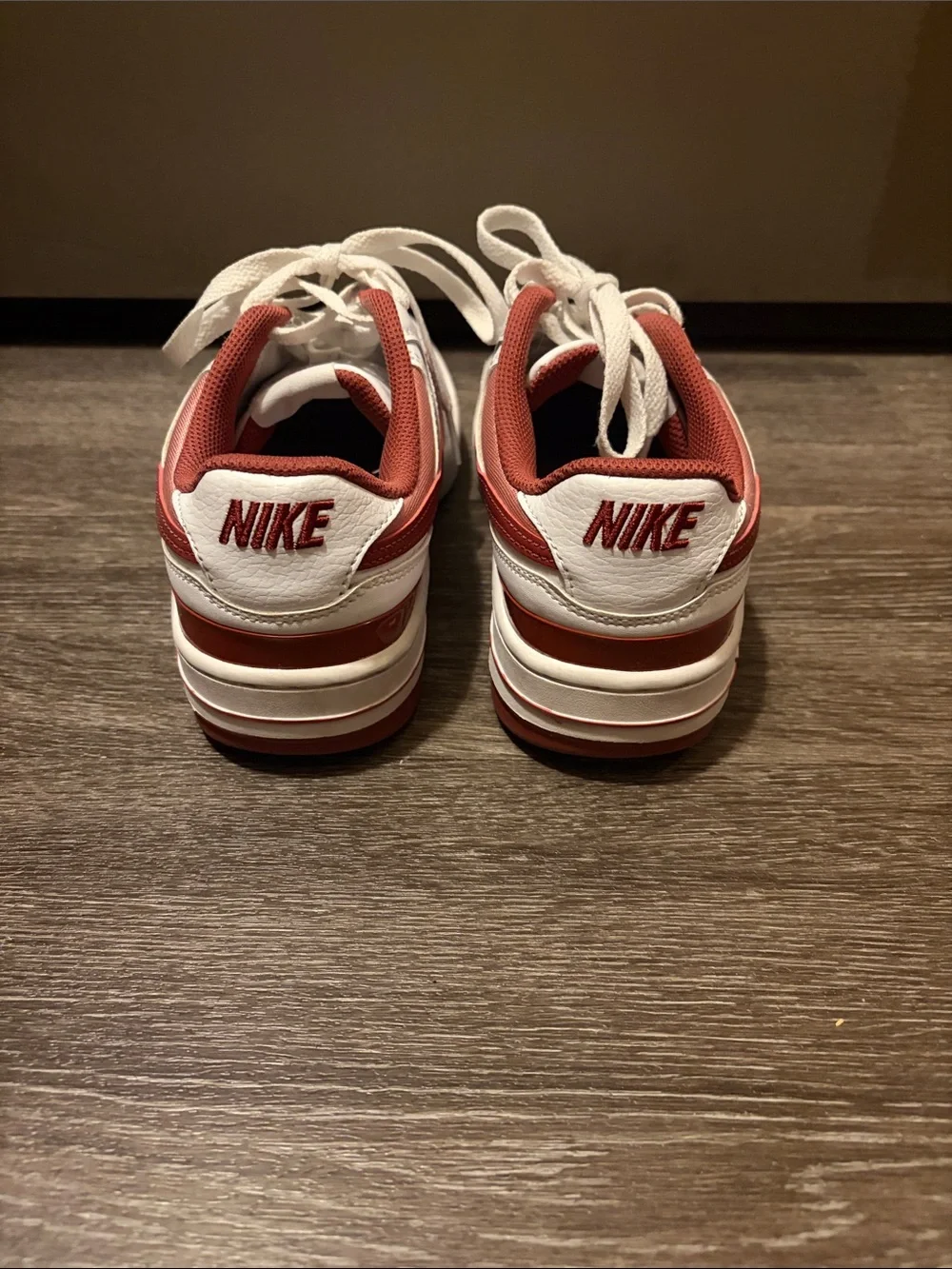 Women’s Nike White Sneakers with Red Swoosh